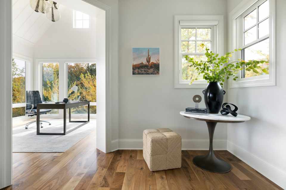 home office in lake home with shiplap white walls